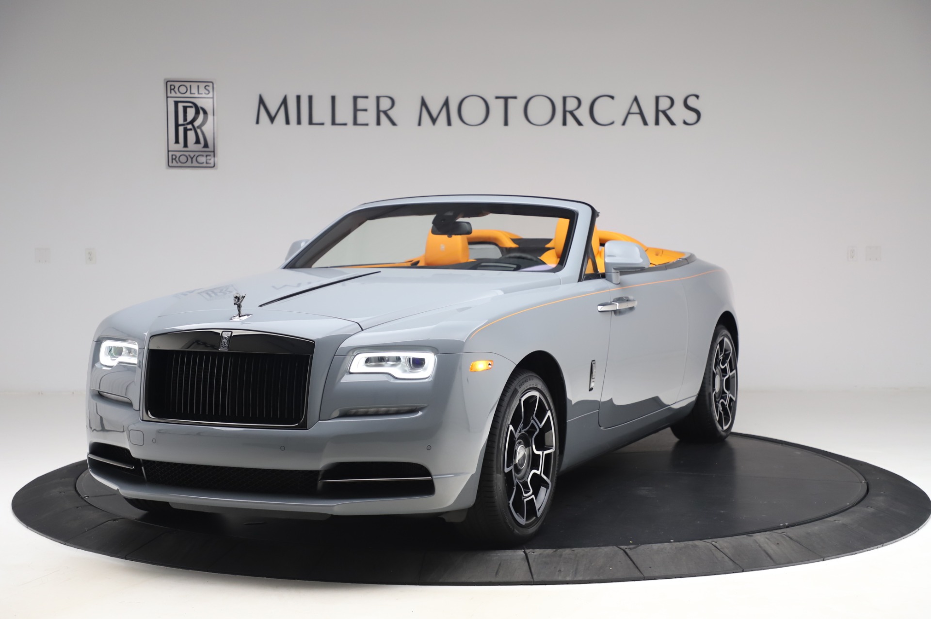 The RollsRoyce Dawn Drophead Coupe orange brown black seats console dash  interior  Rolls royce dawn Rolls royce Royce